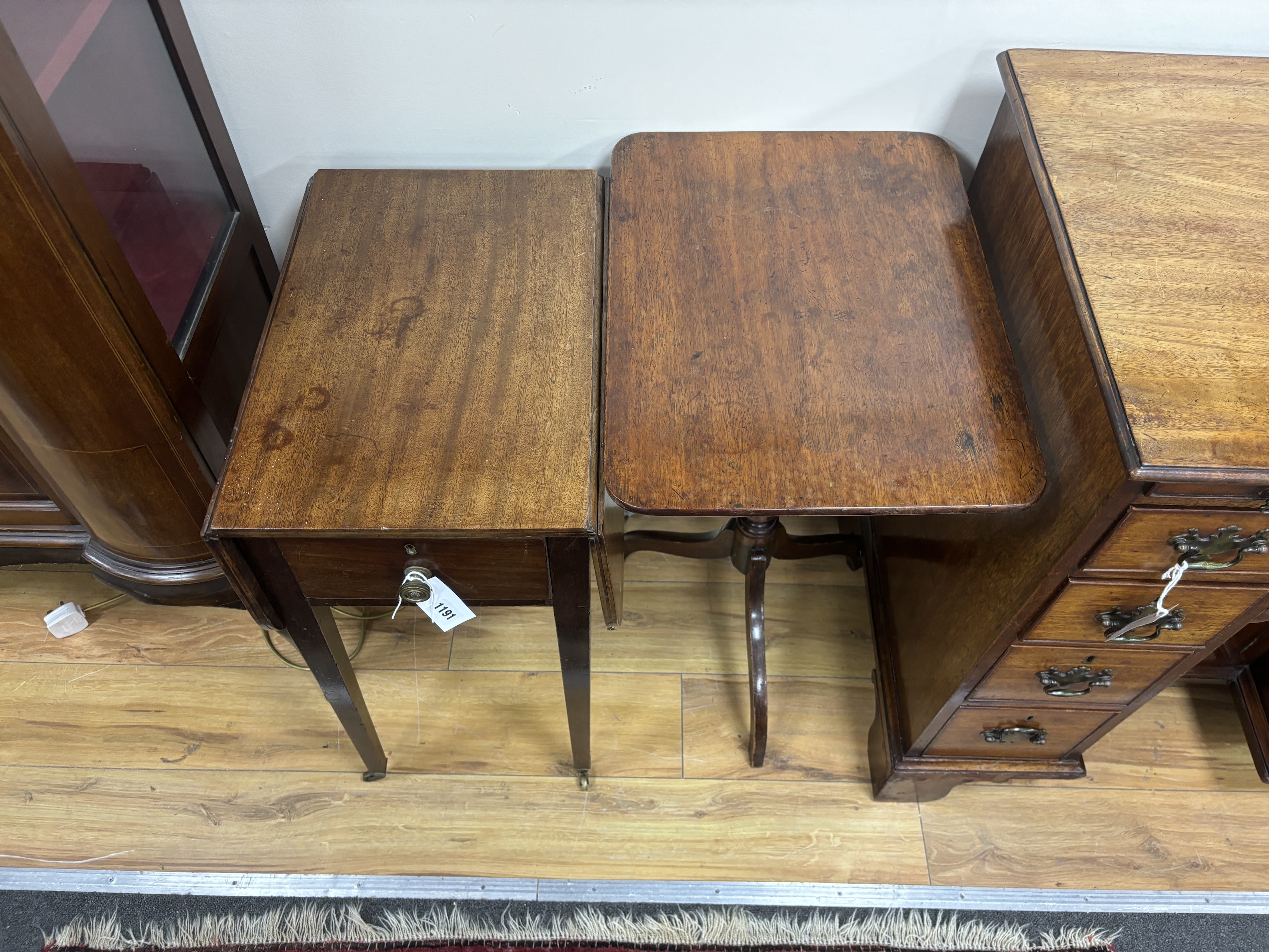 A George III mahogany drop leaf work table, width 33cm, depth 47cm, height 71cm and an early Victorian mahogany rectangular tripod wine table